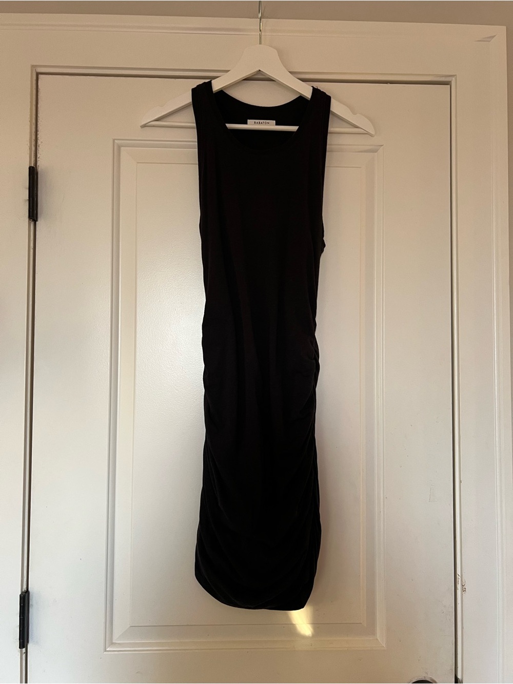Babaton Black Sleeveless Midi Dress with Side Ruching